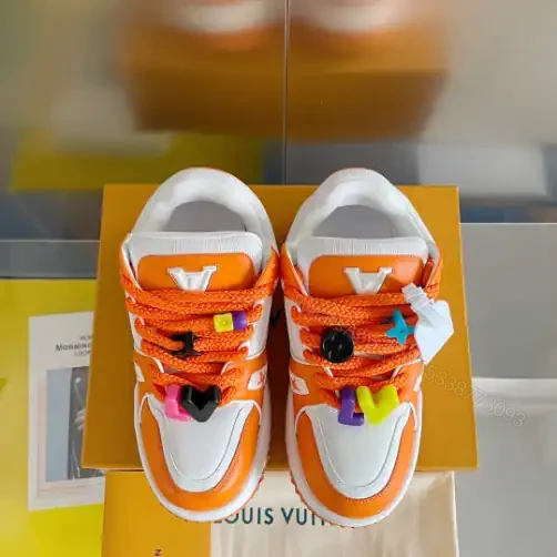 View 7 of LOUIS VUITTON LV TRAINER MAXI SNEAKERS IN ORANGE AND WHITE – LSVT334