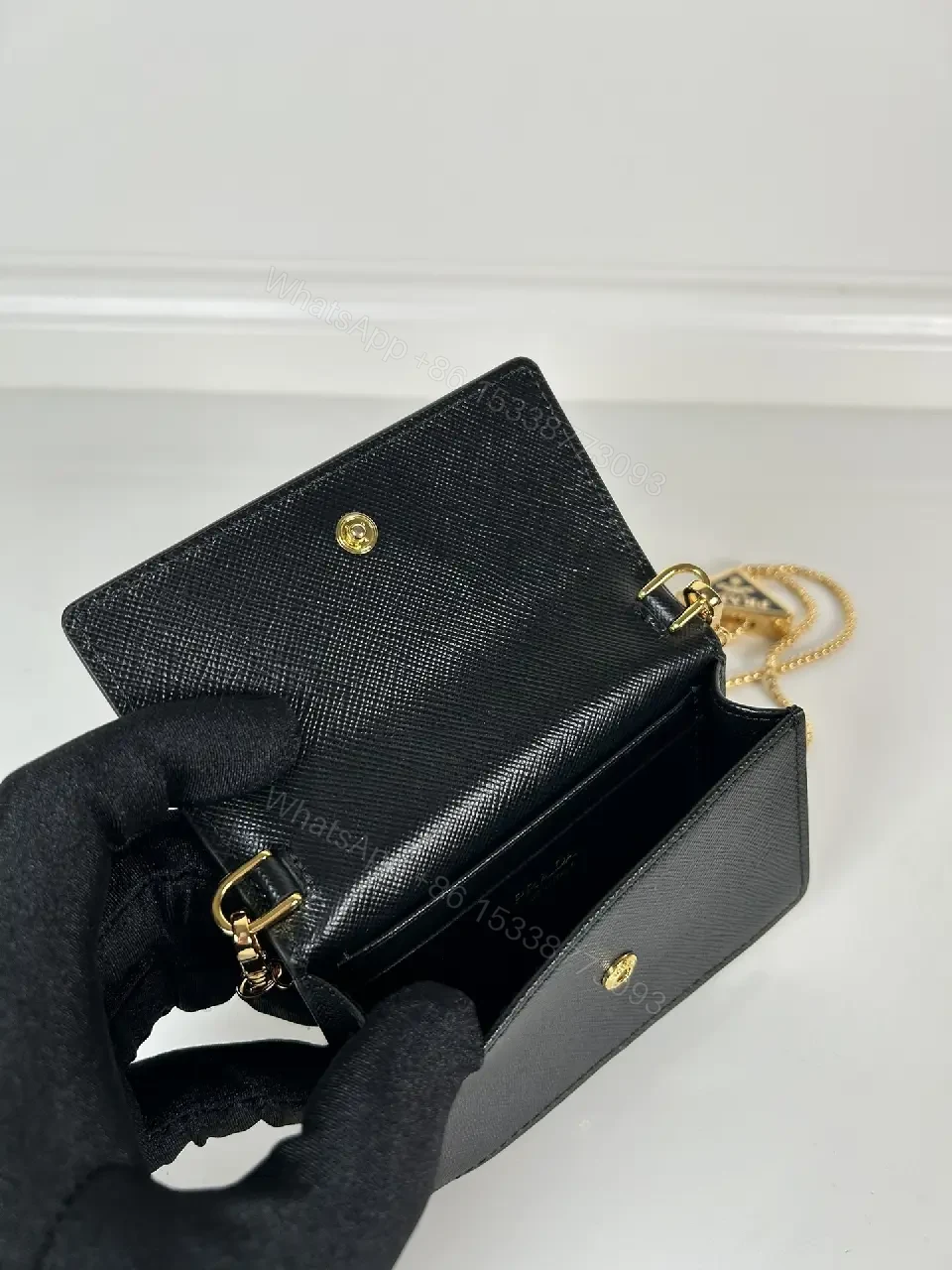 View 8 of Compact Crossbody Bag: Black Leather, Gold Chain, Minimalist Luxe
