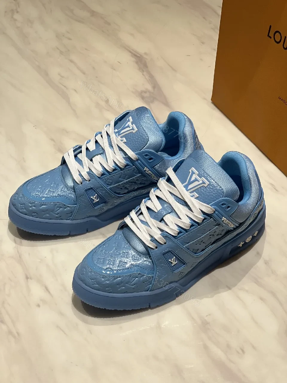 View 2 of Pastel Peak Blue Luxe Trainer with Monogram Texture