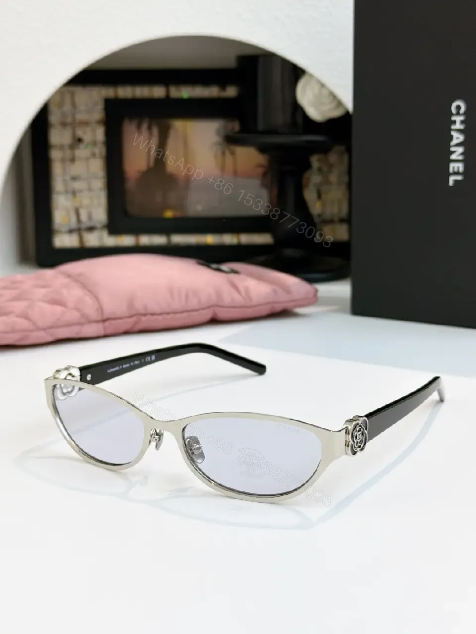 View 2 of Gold Cat-Eye Sunglasses with Chanel Logo Accents