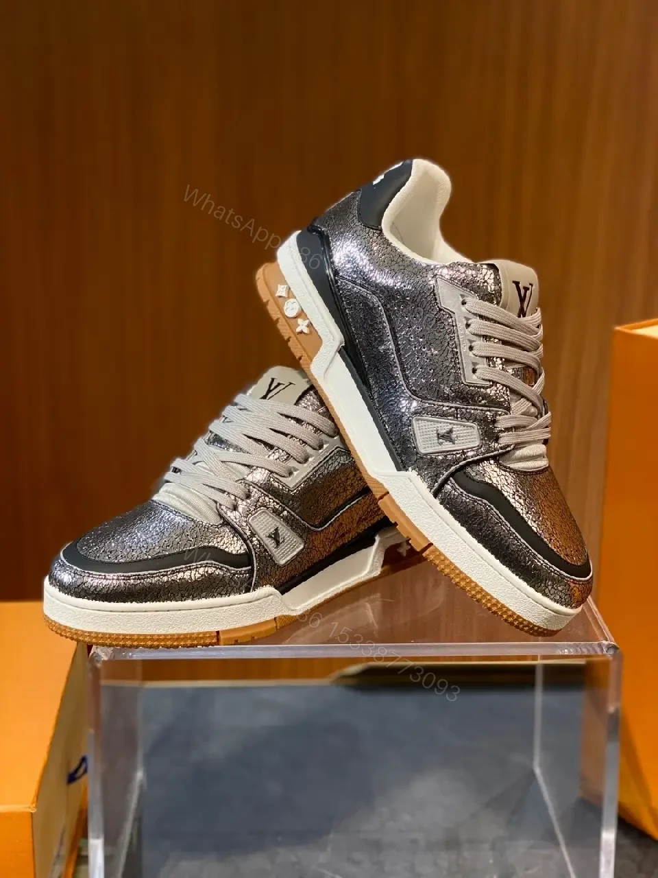 View 2 of Metallic Leather High-Top Sneakers with Subtle LV Detailing