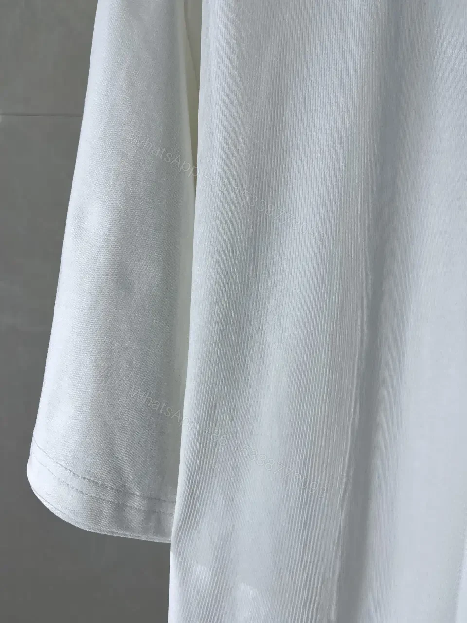 View 6 of White Satin Loose-Fit Tee with Subtle Sheen Embroidered Logo T-shirt