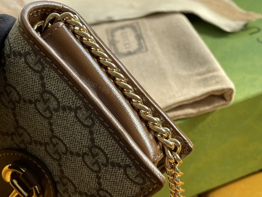 View 2 of GG Canvas GG Supreme Shoulder Bag - Gold-Honed Hardware, Compact Luxury