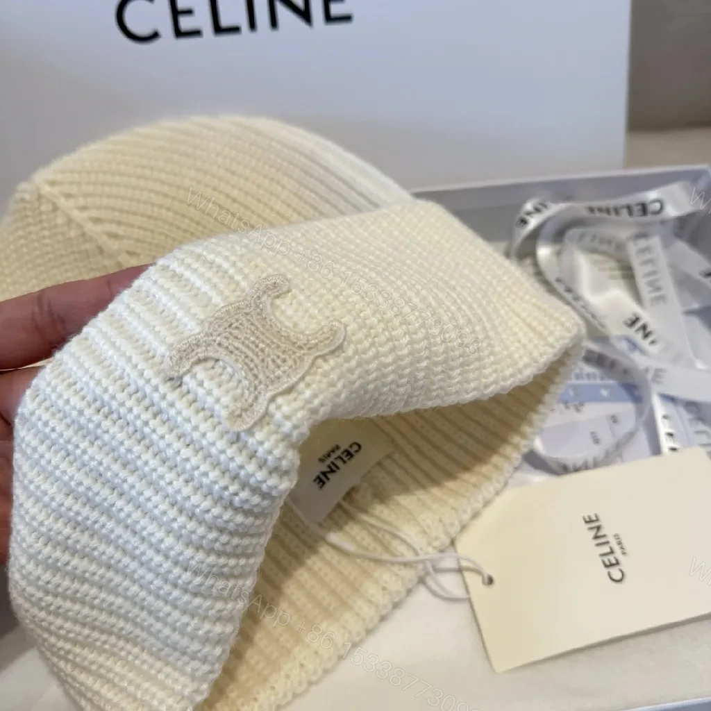 View 5 of Cream Knit Beanie + Ribbed Material + Minimalist Style + Subtle Monogram + Beanie