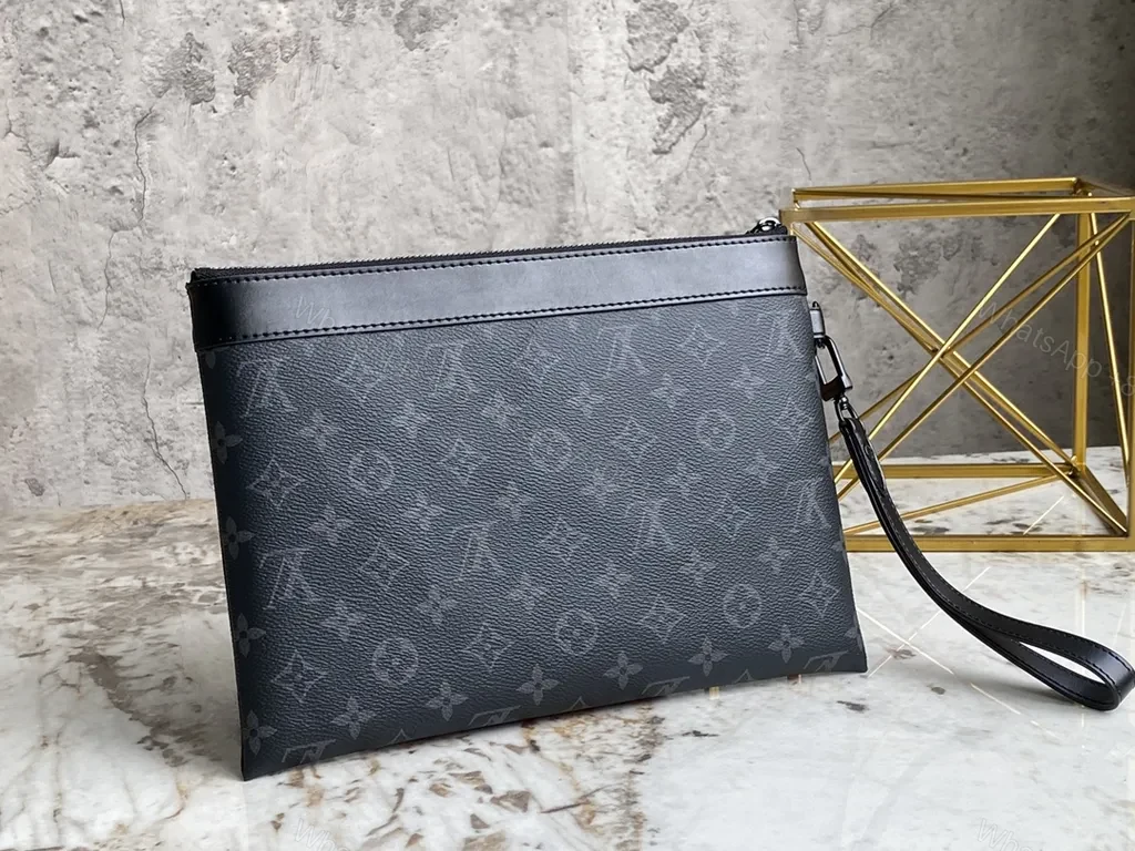 View 8 of Dark Monogram Clutch: Luxe Black Canvas, Leather Trim, Wrist Strap