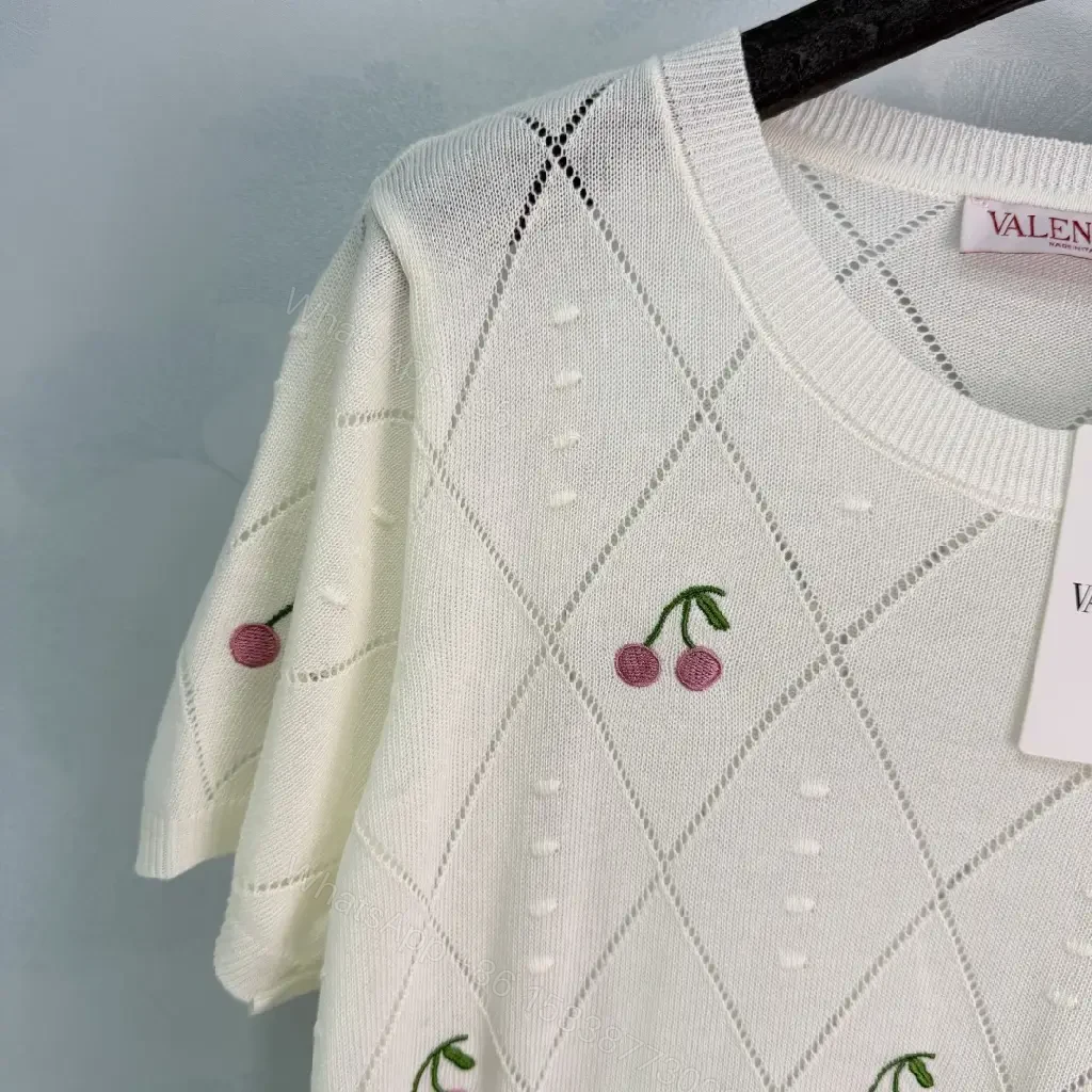 View 7 of Cream/Light Heather Knit V-Neck Cropped Argyle Diamond Top