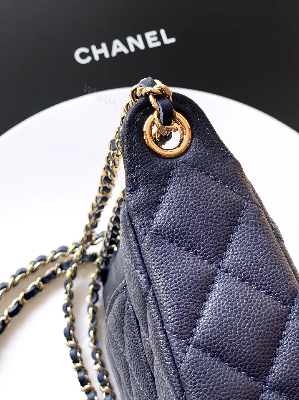 View 6 of Navy Quilted Crossbody: Gold-Emblem, Compact Luxury Bag