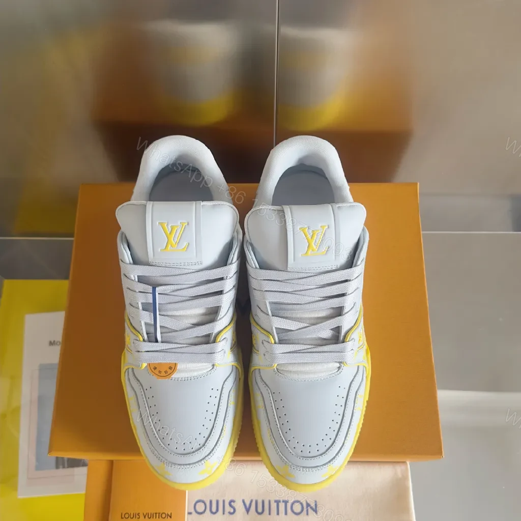 View 9 of Bold Leather High-Top Sneakers with LV Accents