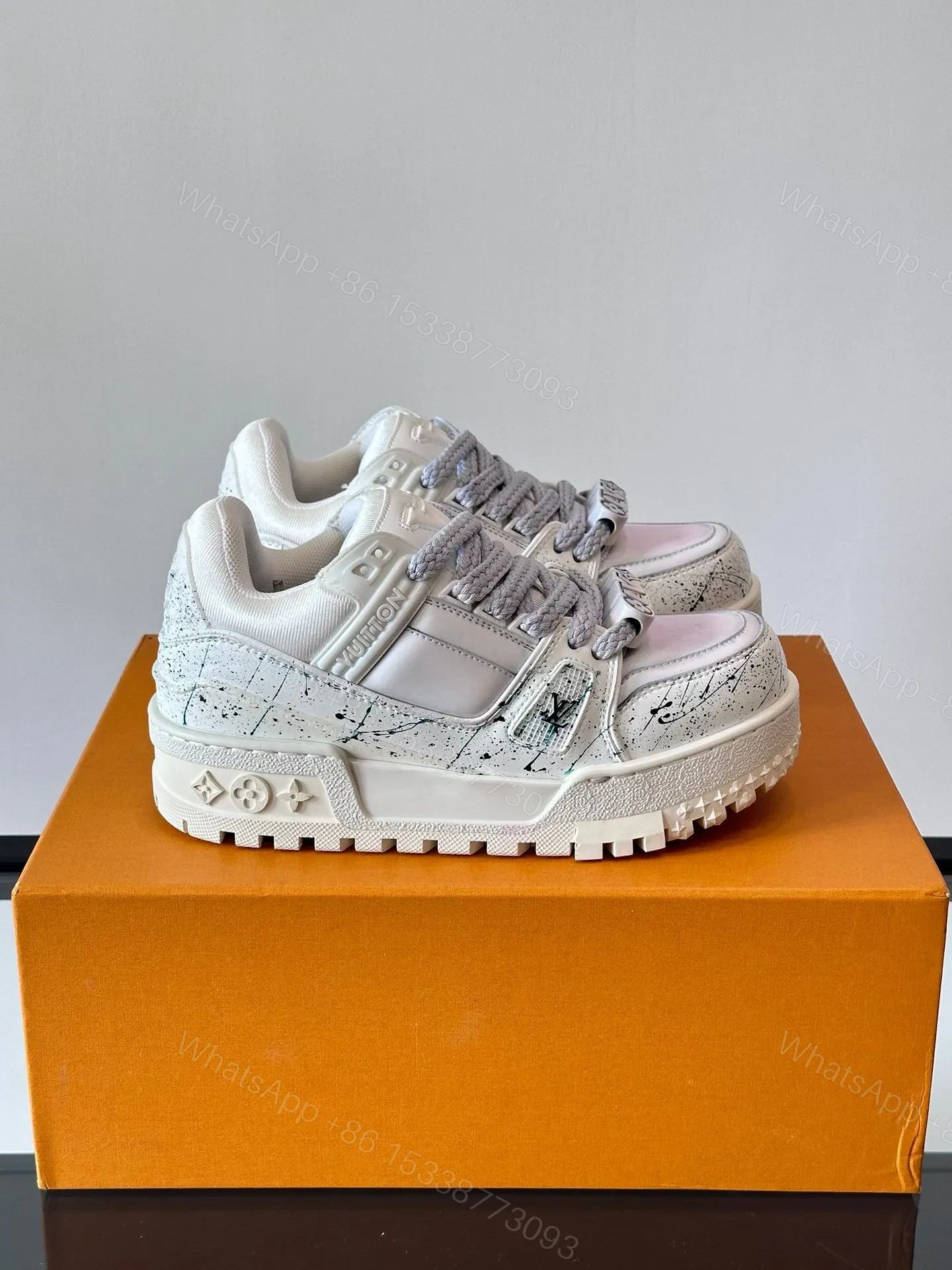 LV Men White Leather Sneakers With Black Splatter — view 1