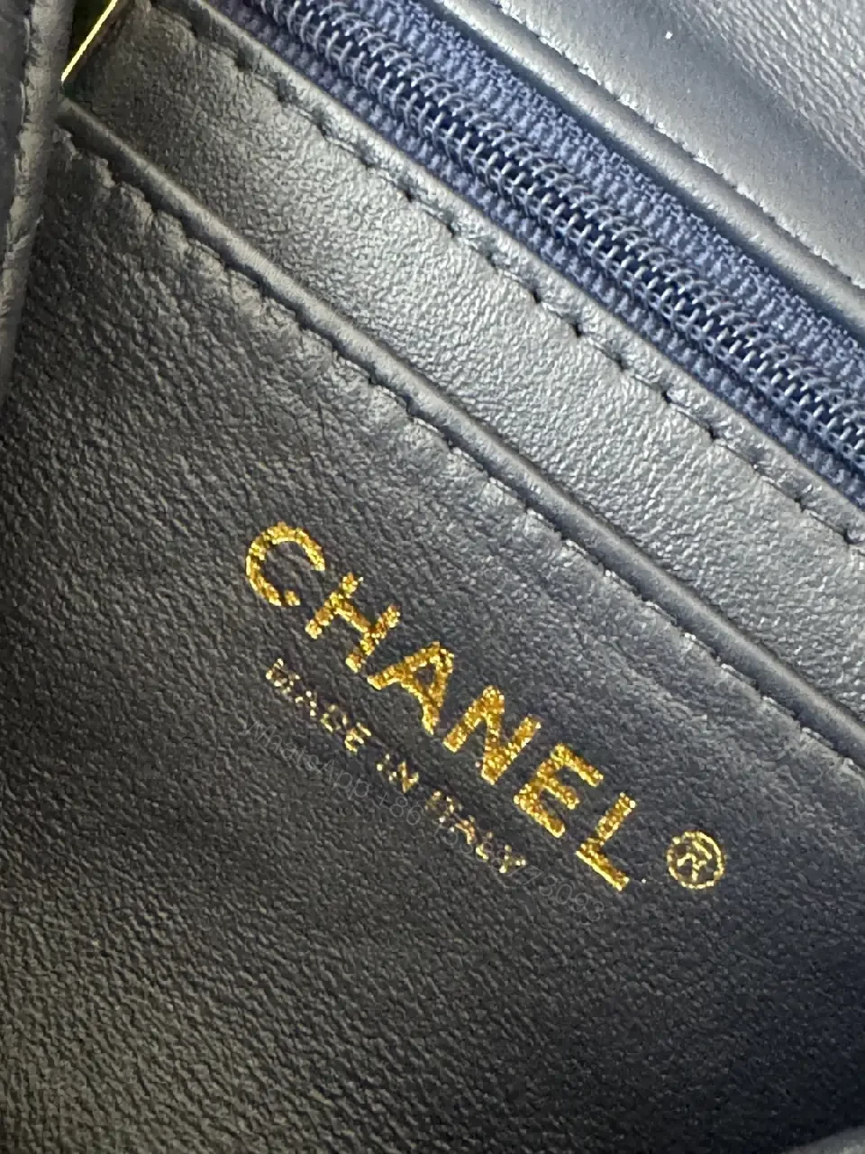 View 4 of Quilted Leather Mini Bag with Gold Emblem - Compact Glamour