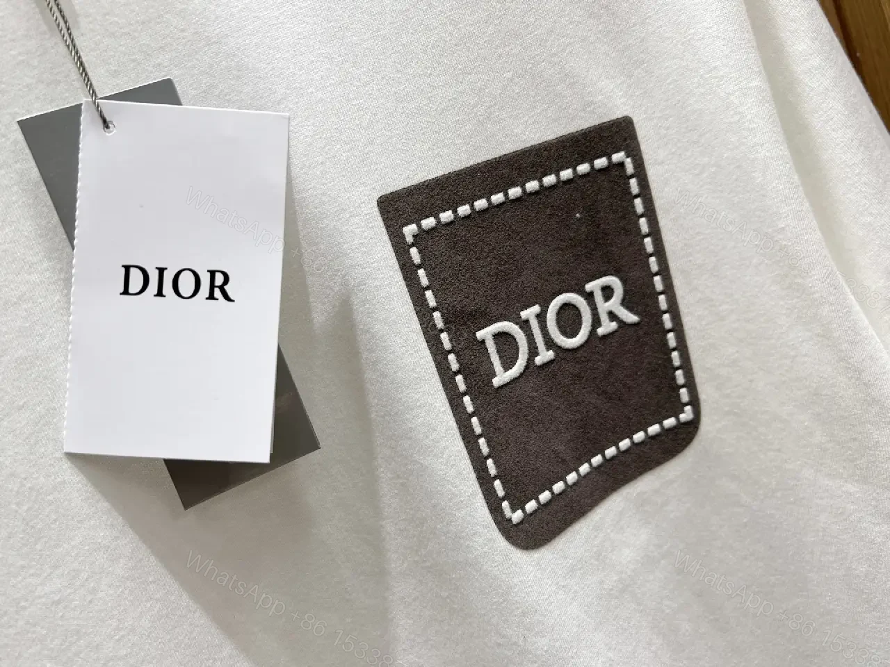 View 7 of Minimalist White Tee with Dior Pocket: Subtle Luxury T-Shirt