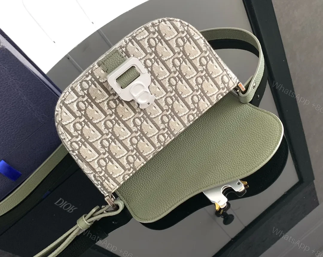 View 9 of Olive Pebbled Leather Crossbody with Monogram Accent