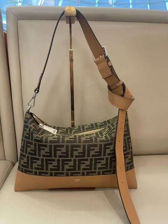 Black Canvas + Leather Accents + Compact Messenger + Signature Fendi-Inspired Pattern + Bag — view 1