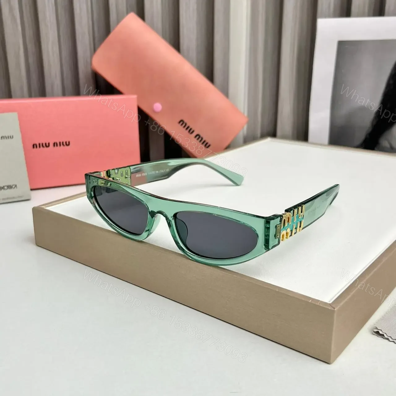 Miu Miu Cat Eye Green-Black Sunglasses One Size — view 1