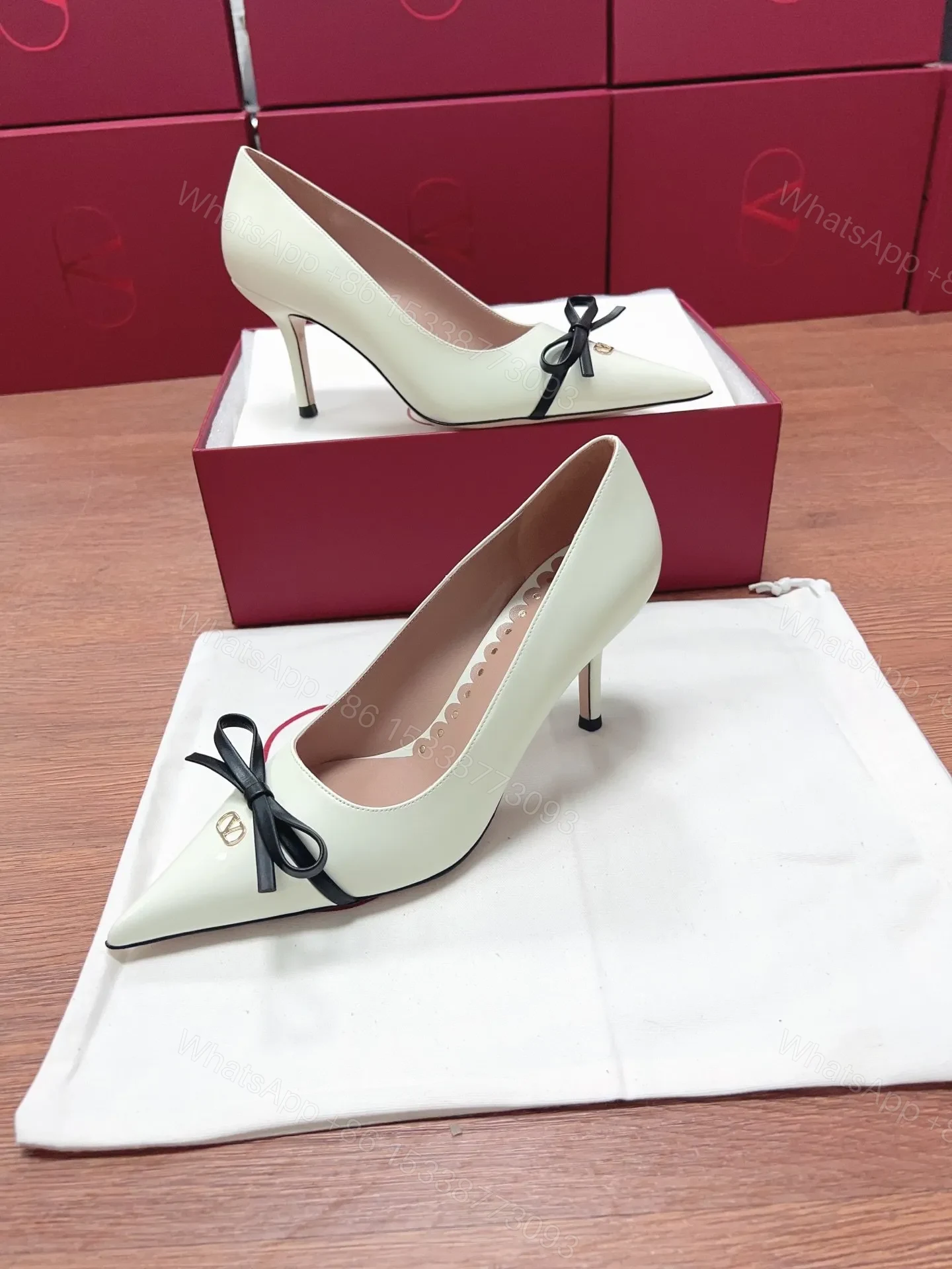 View 2 of Valentino Women White Leather Pointed Toe Pumps