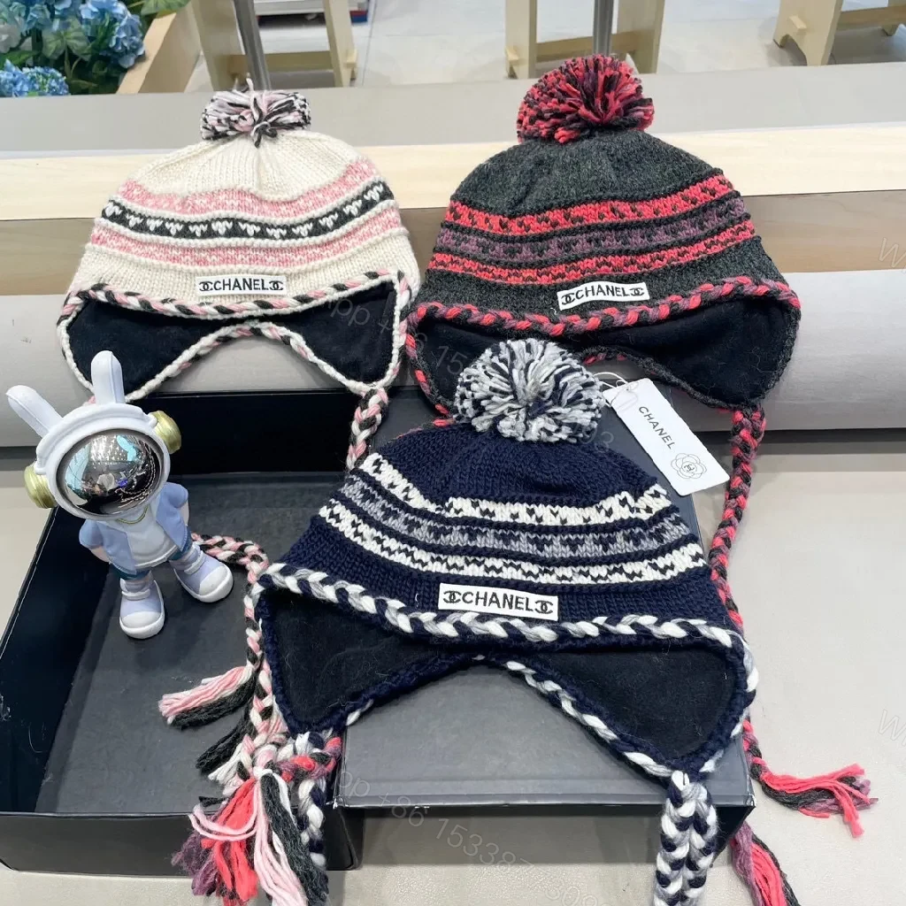 View 9 of Chic Knit Pom Beanie with Braided Tie-Through Straps