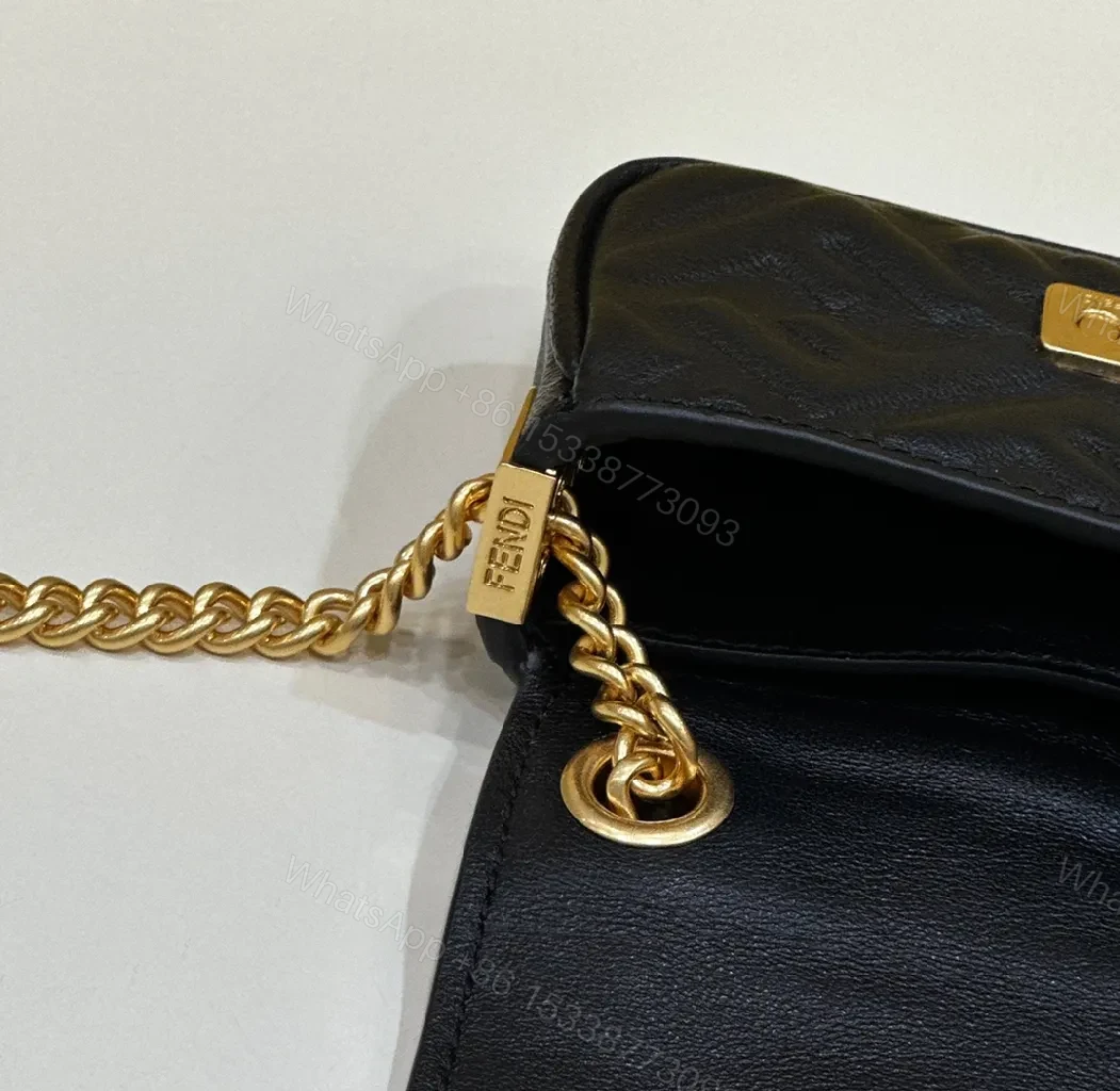 View 9 of Compact Leather Crossbody: Textured Luxury with Gold Chain Strap