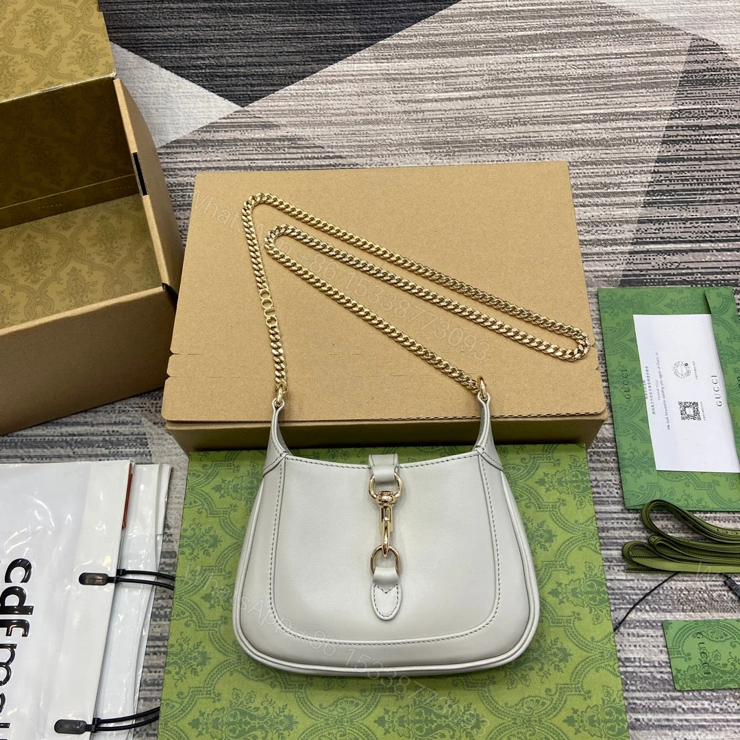 JACKIE NOTTE MINI BAG 19 IN WHITE CALFSKIN GOLD HARDWARE — view 1