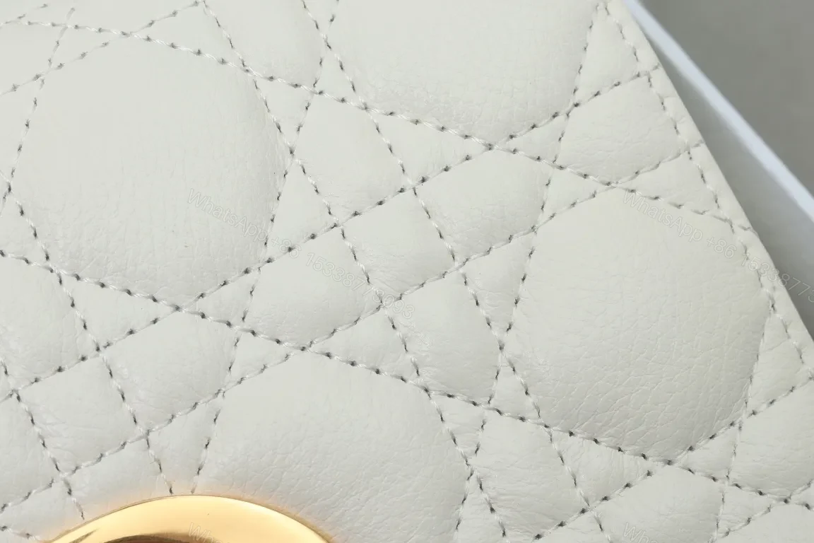 View 6 of Quilted Mini Bag with Gold Hardware, Luxe Style, Crossbody versatility