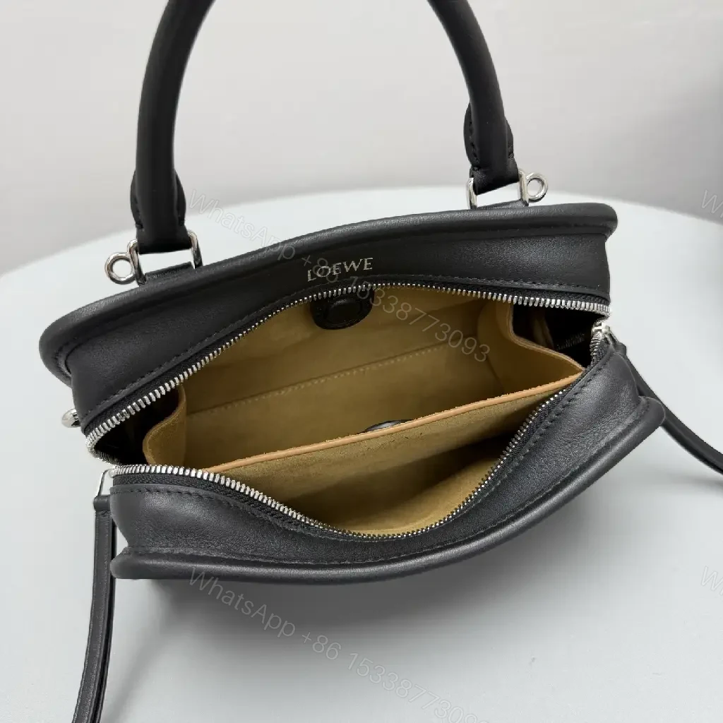 View 9 of Structured Black Leather Mini Bag | Compact, Versatile Carryall