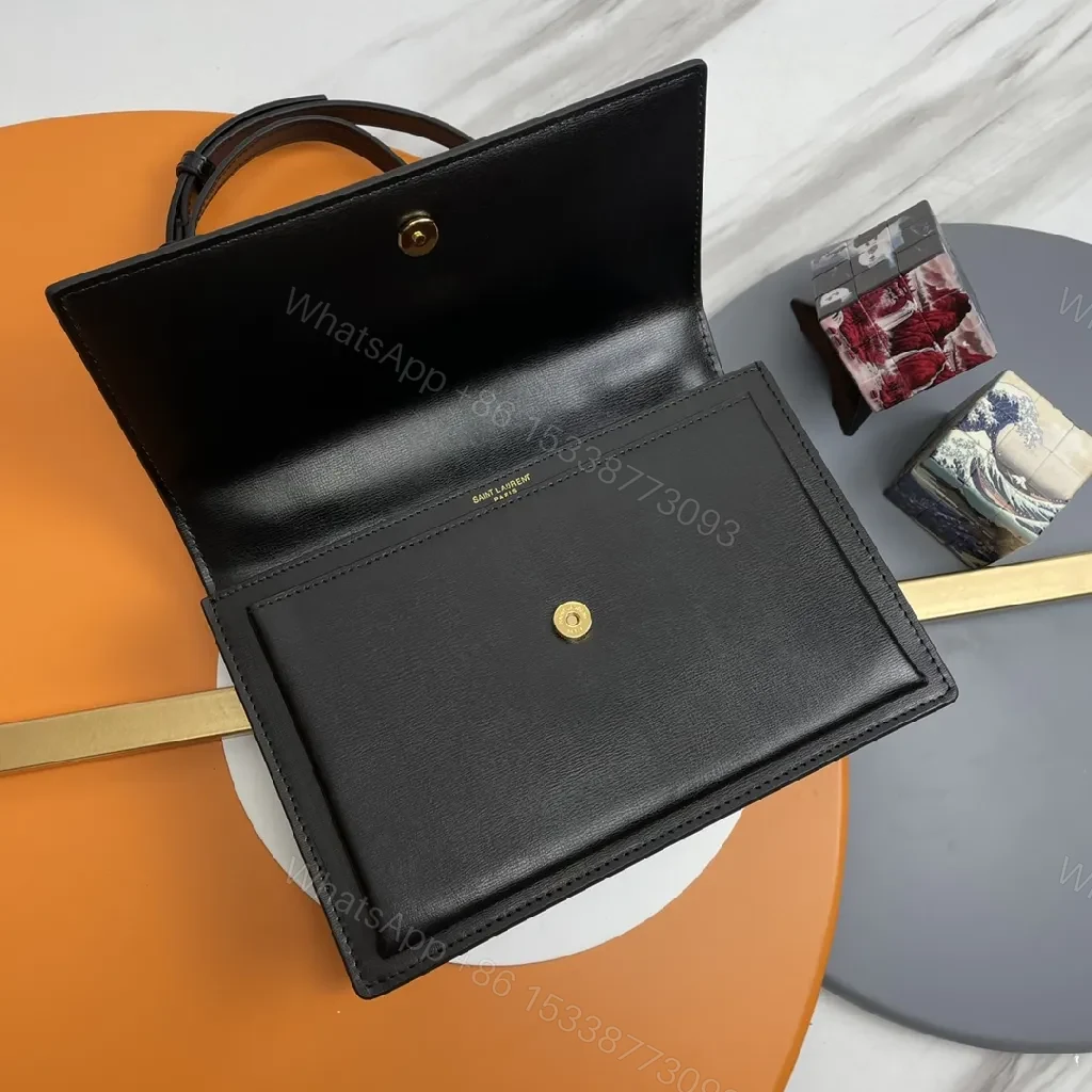 View 4 of Chic Black Leather Crossbody with Gold Emblem: Compact Luxury