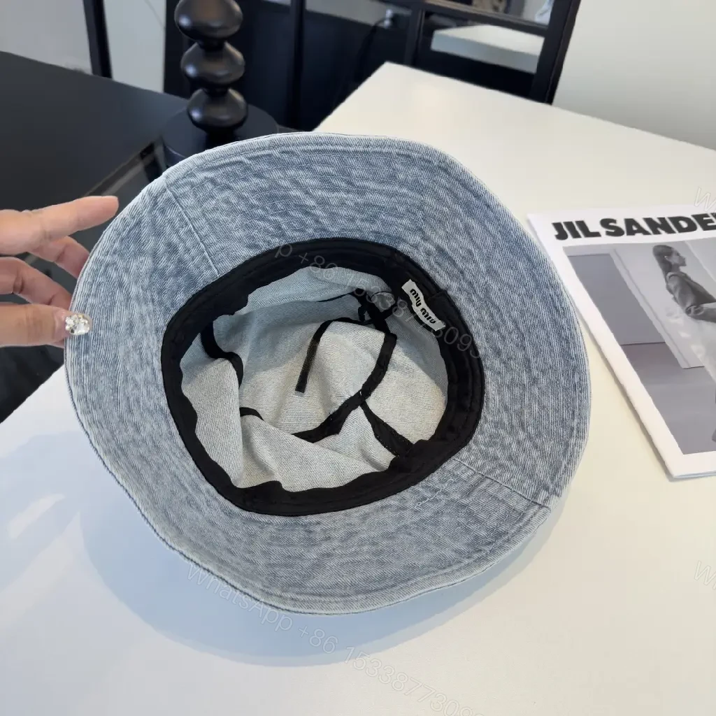 View 4 of Denim Bucket Hat - Lightweight, Subtle Logo, Stylish Everydaywear