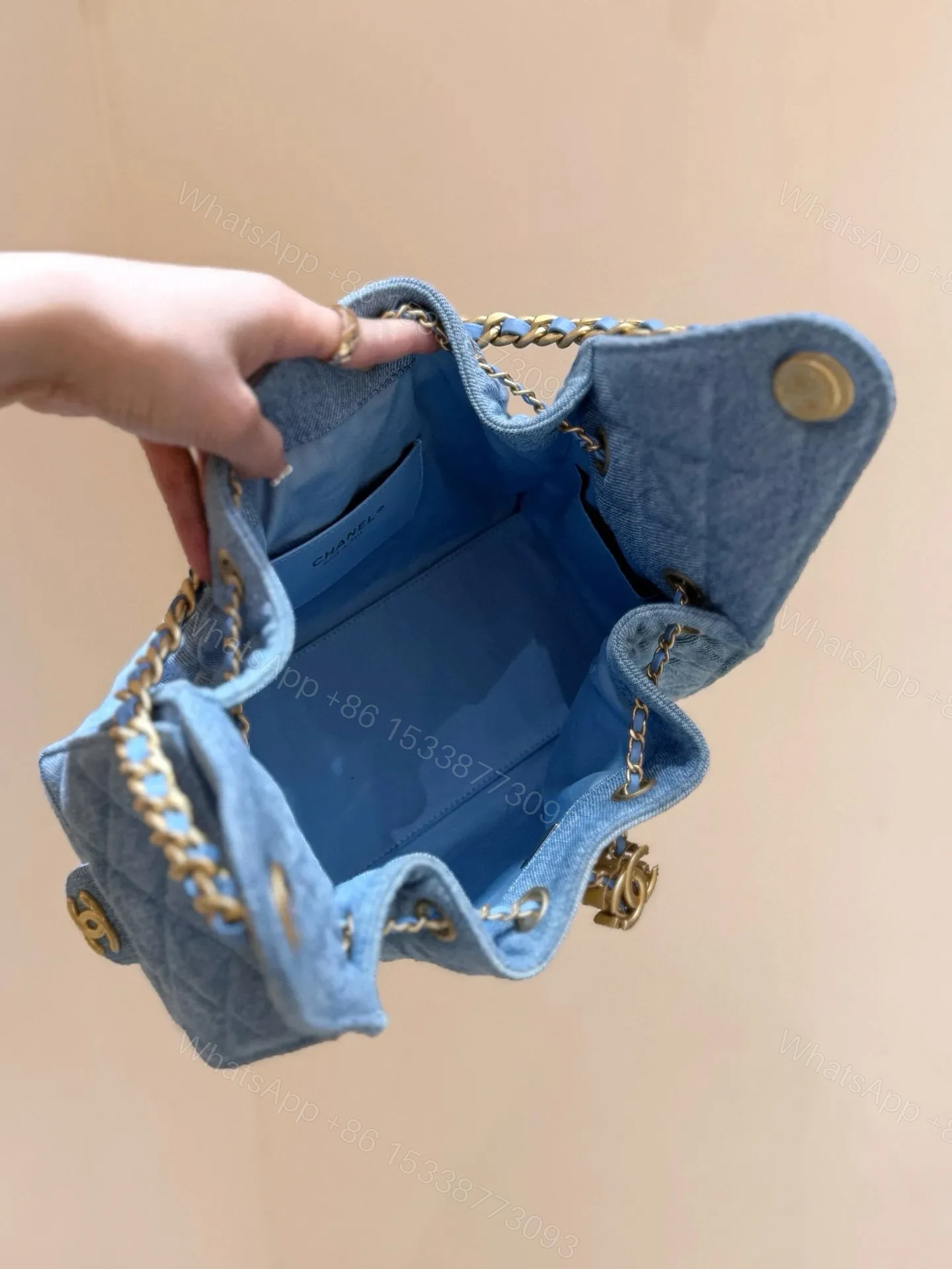 View 9 of CHANEL 25 SMALL IN BLUE 30 DENIM GOLD HARDWARE