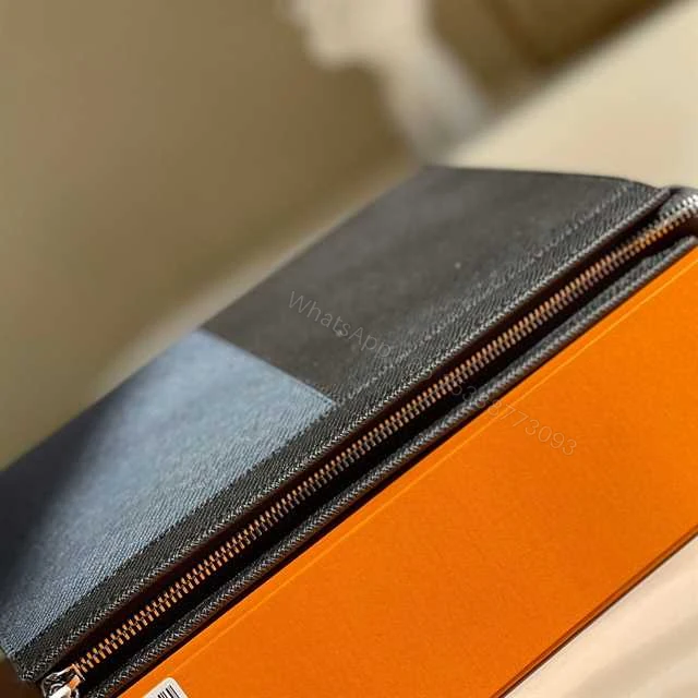 View 8 of LOUIS VUITTON POCHETTE VOYAGE MM TAIGA LEATHER M30718