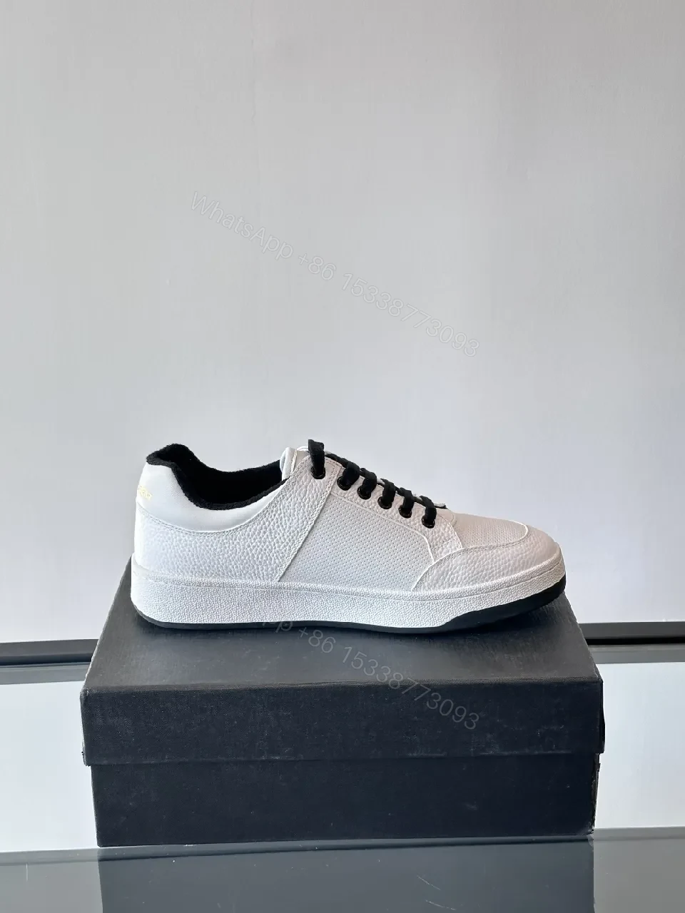 View 6 of White Leather Sneaker with Black Accents — Minimalist Luxury Sneaker