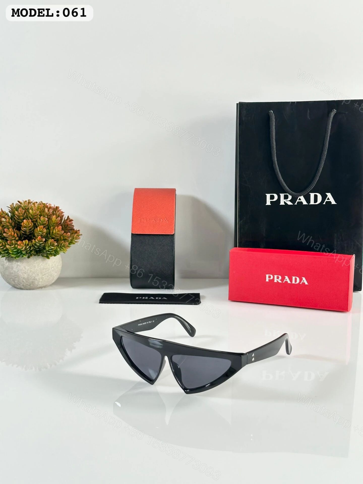 Prada Model 061 Black Sunglasses Plastic Frame — view 1