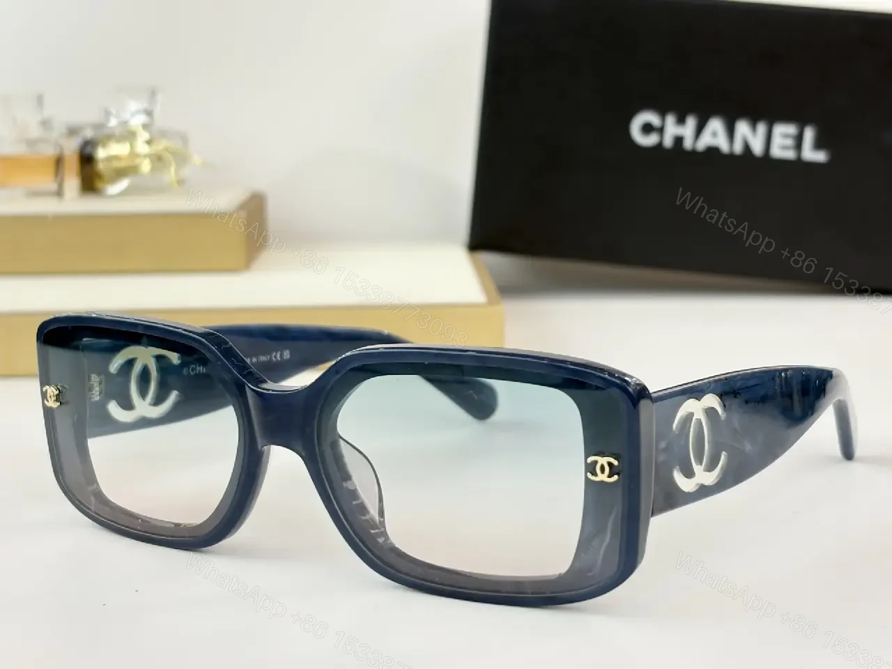 View 6 of Bold Black Acetate Rectilinear Sunglasses, Gold Accents, UV400 Protection