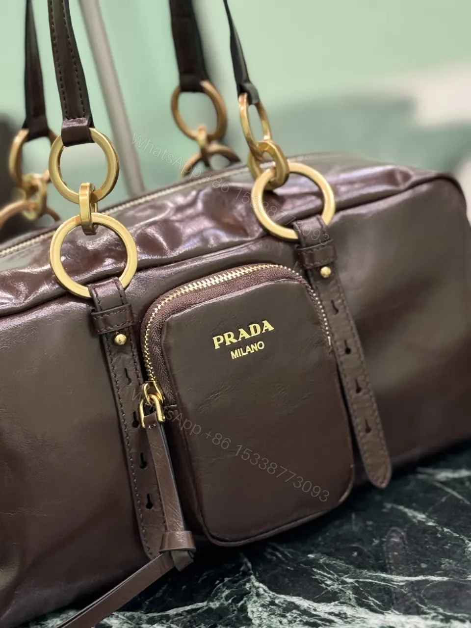 View 4 of Chic Black Leather Handbag with Gold Hardware & Structure