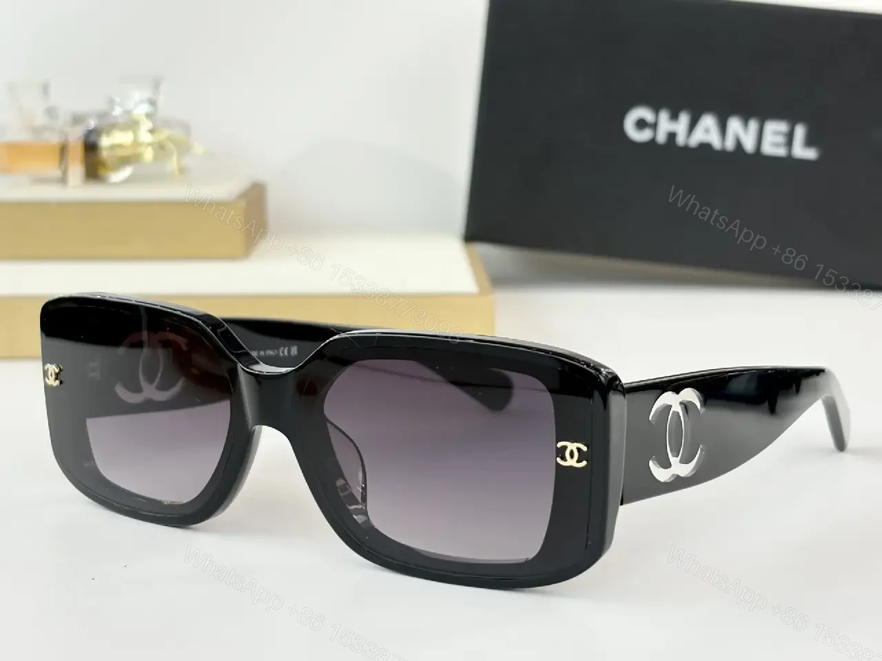 View 3 of Bold Black Acetate Rectilinear Sunglasses, Gold Accents, UV400 Protection