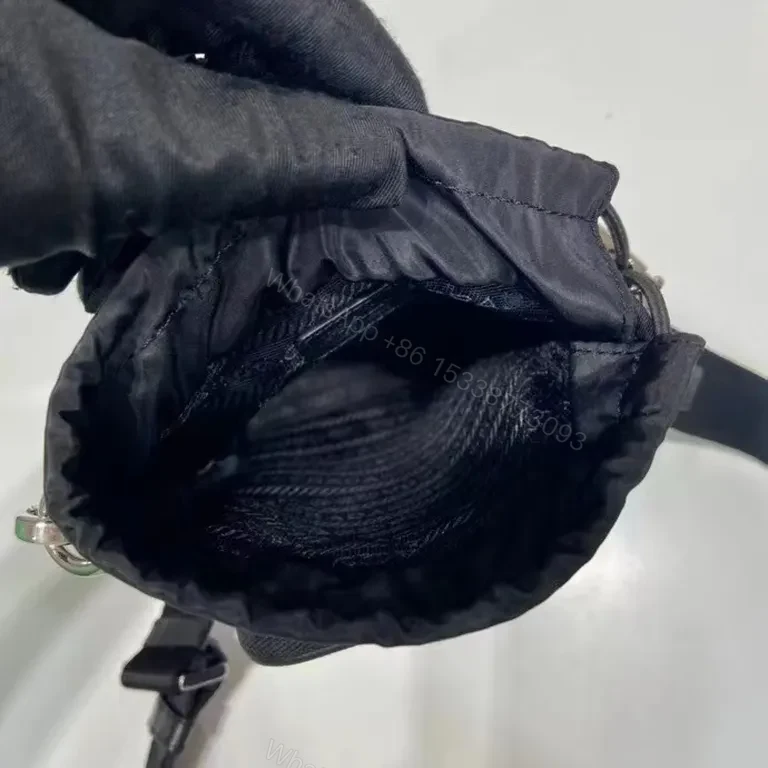 View 5 of Black Nylon Messenger Bag — Faux Prada Logo, Drawstring Closure, Adjustable Strap