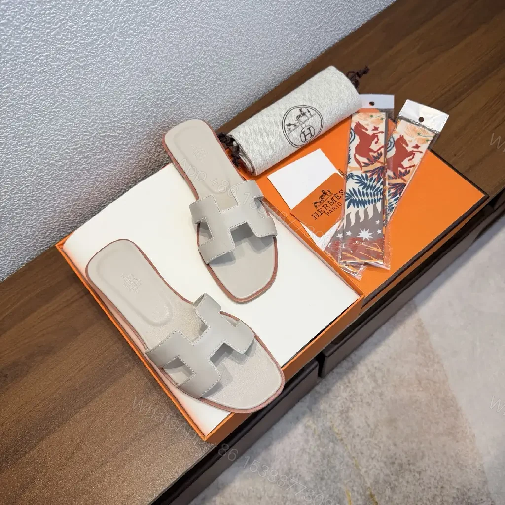 View 5 of White Leather Hermès Sandals with Cross Straps Slide Sandals Preview Set