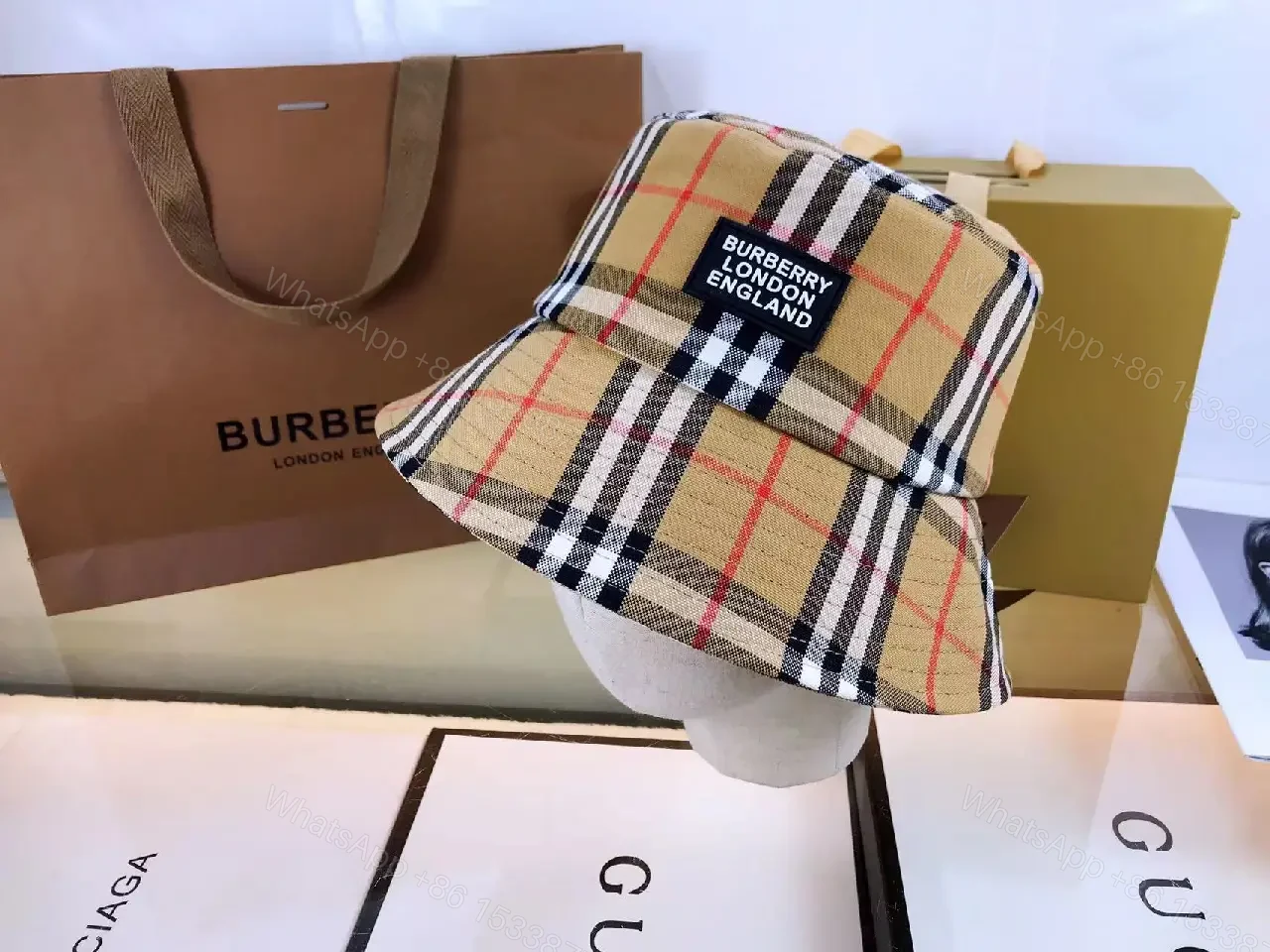 View 2 of Chic Plaid Bucket Hat with Timeless, Modern Utility