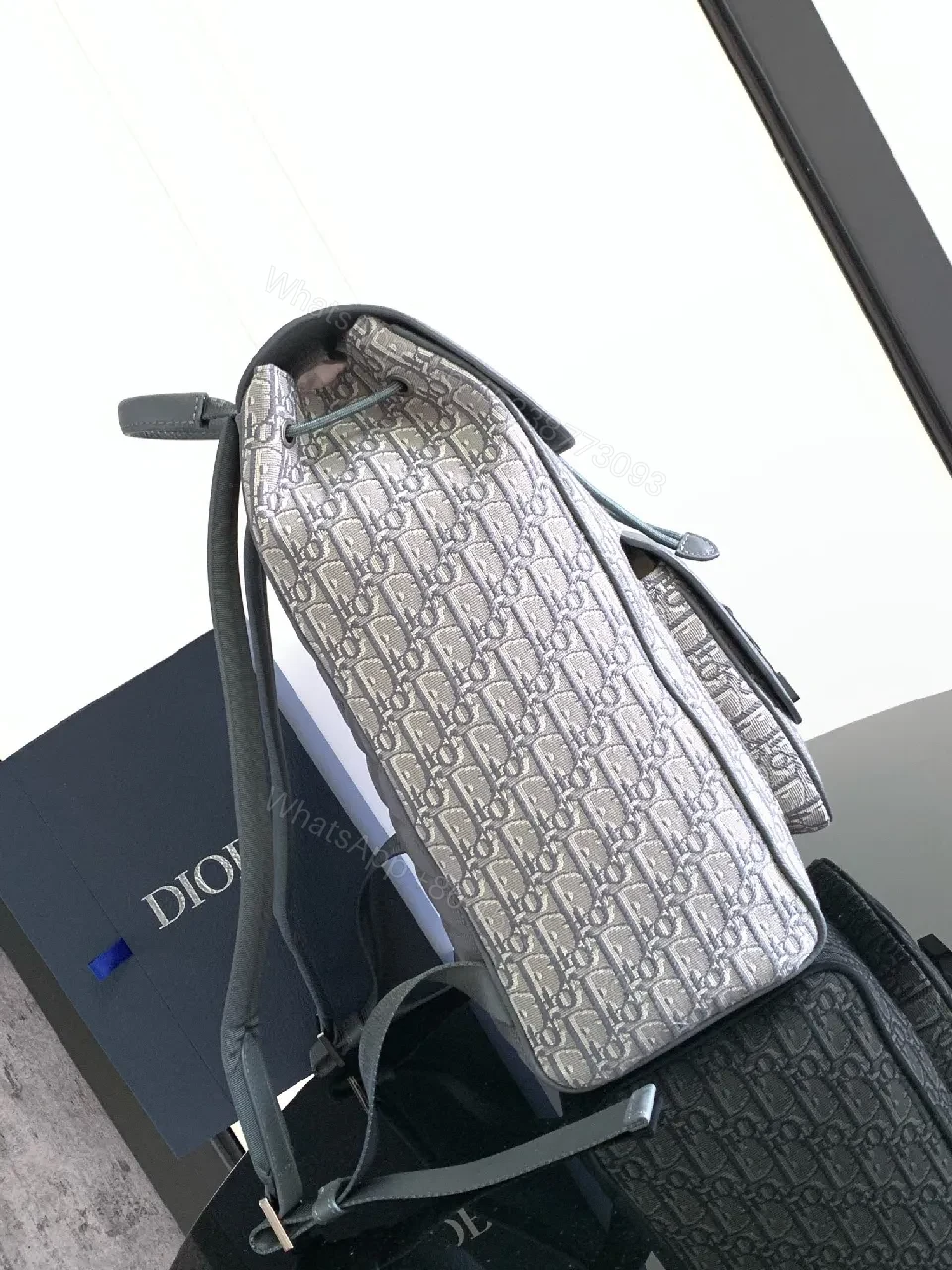 View 8 of Compact Monogram Luxe Backpack with Structured Pocketing