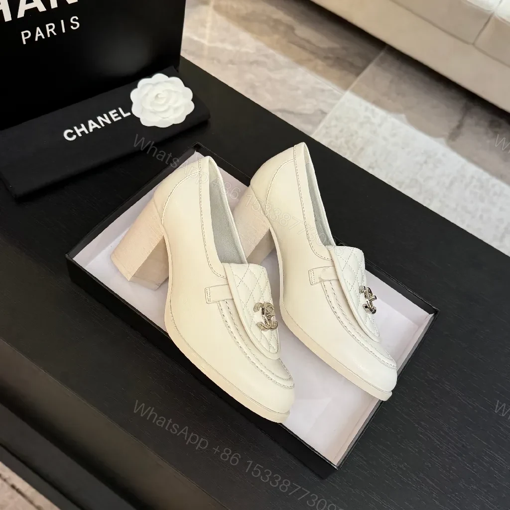View 3 of Cream Leather Quilted Loafers with Signature Detail - Slip-On Style