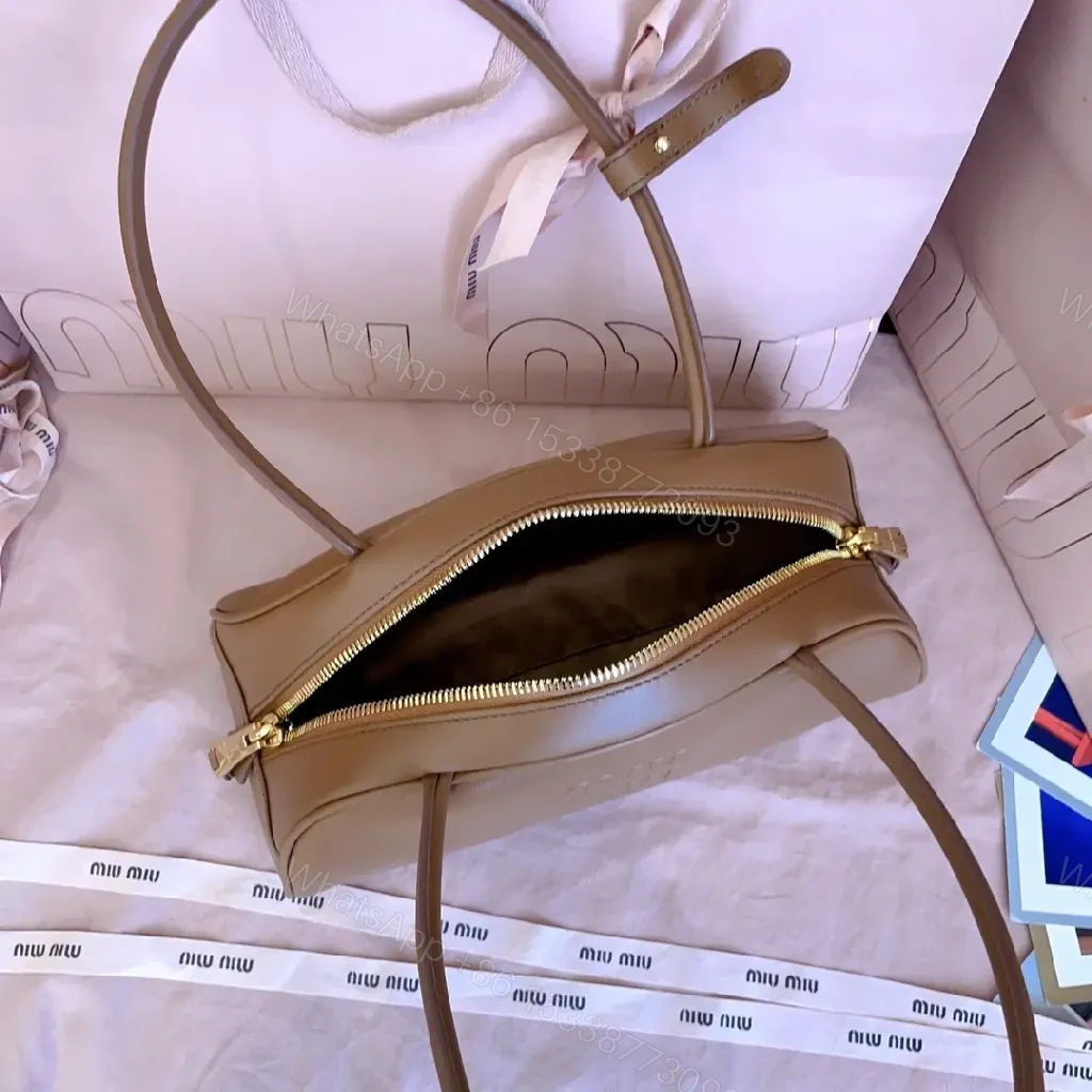 View 9 of Caramel Leather Dome Bag: Structured Luxury, Minimal Detailing