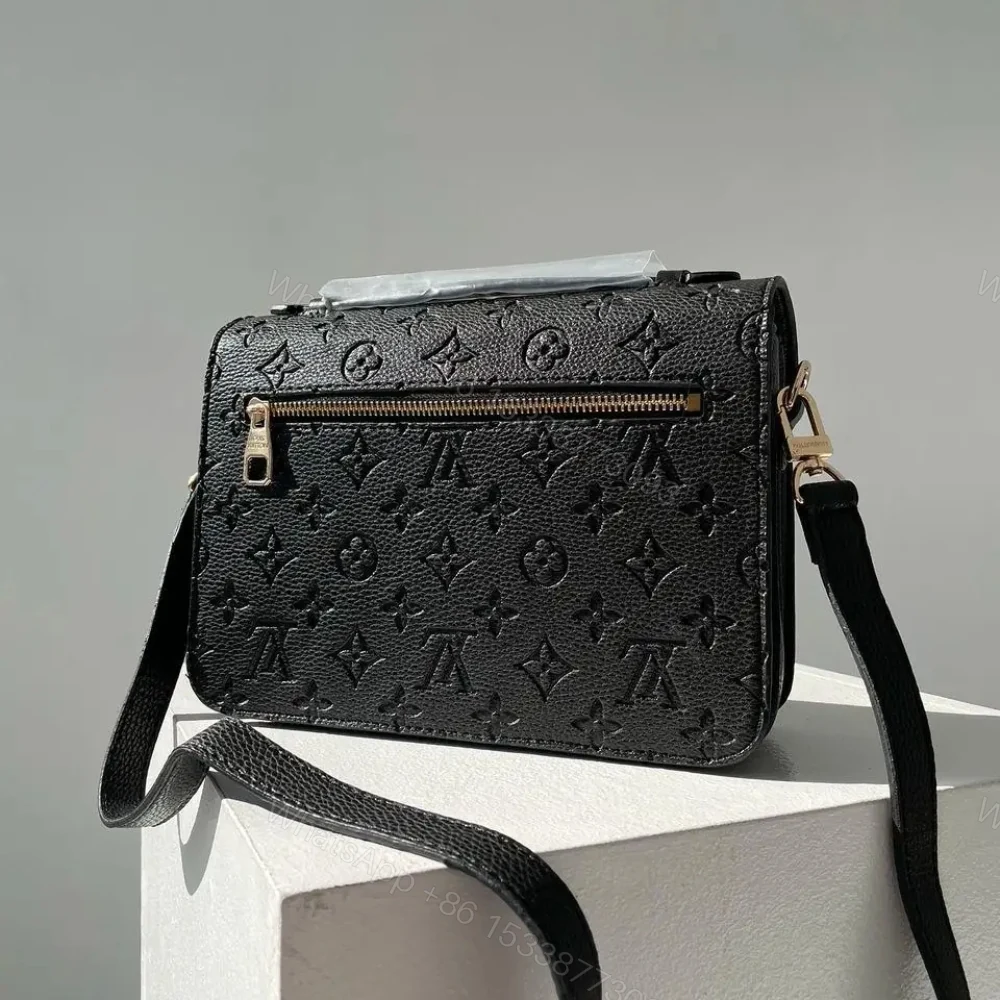 View 4 of Louis Vuitton Pochette Métis Monogram Empreinte Black 25Cm M41487