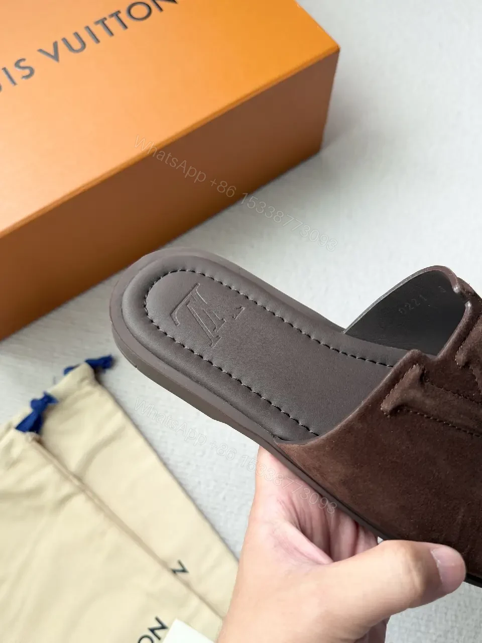 View 6 of Textured Suede Slide with LV Detailing
