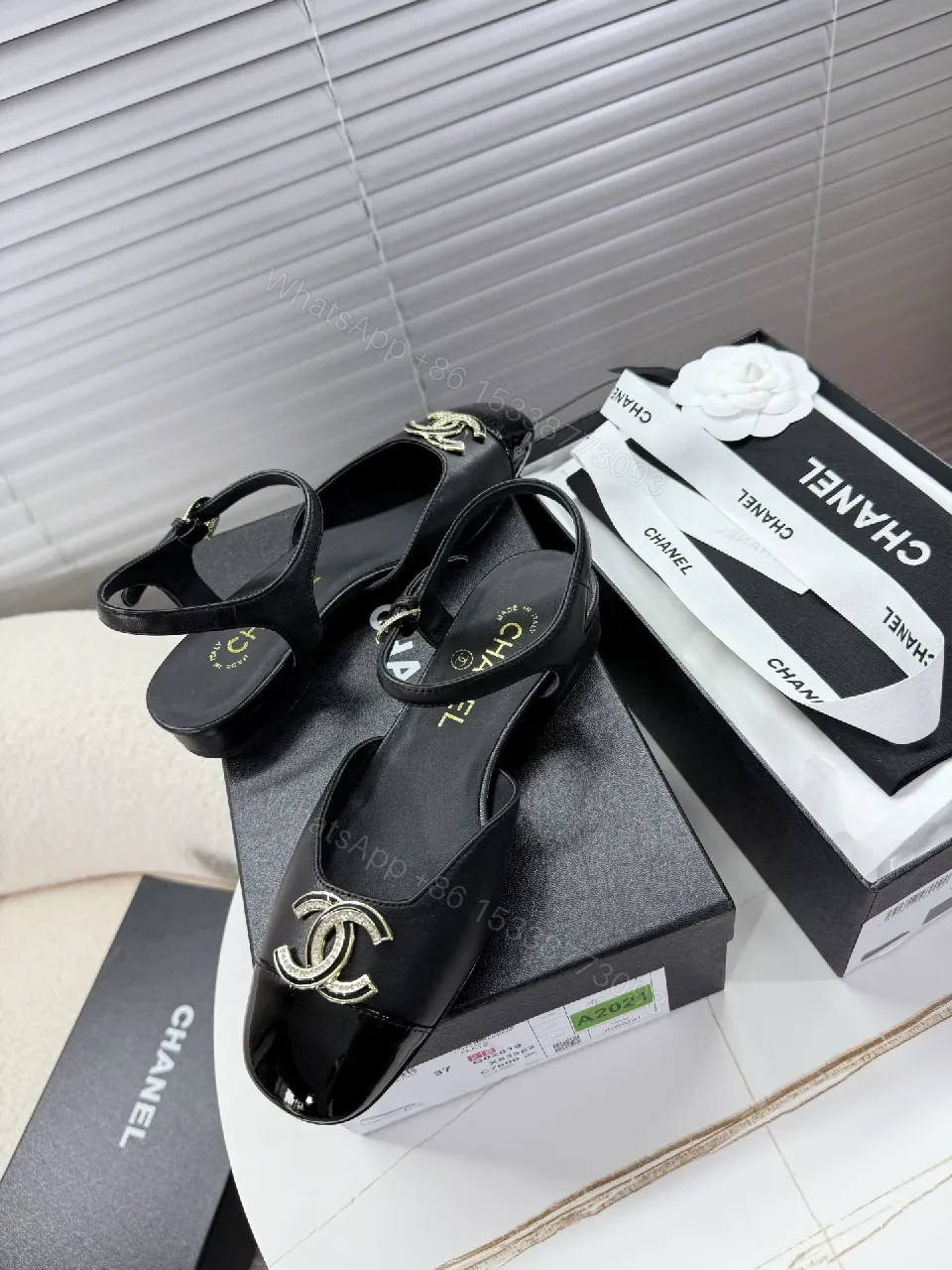 View 6 of Black Satin-Patent Slingback Flats with Gold Logo Hardware