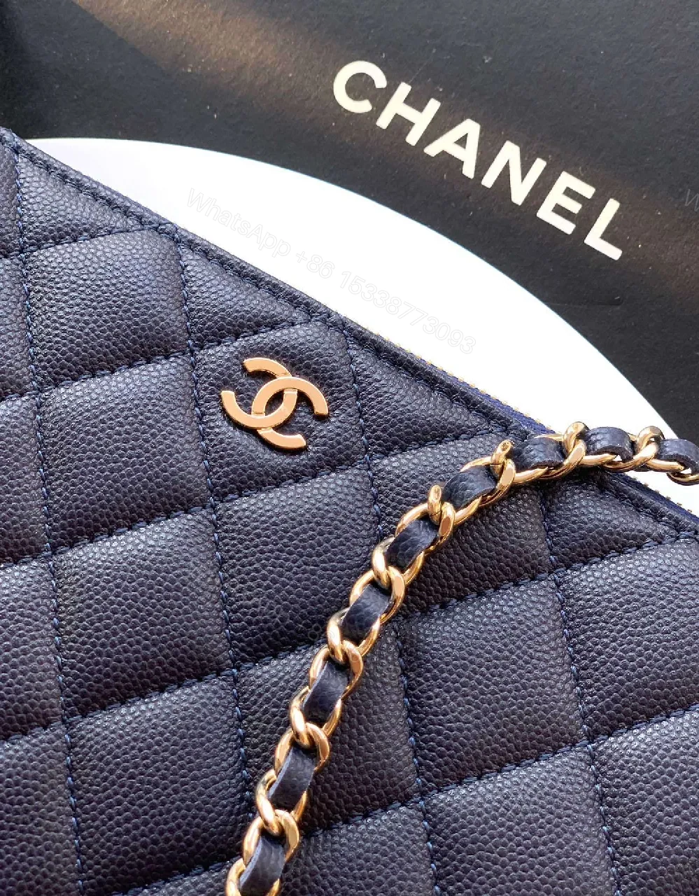 View 5 of Navy Quilted Crossbody: Gold-Emblem, Compact Luxury Bag