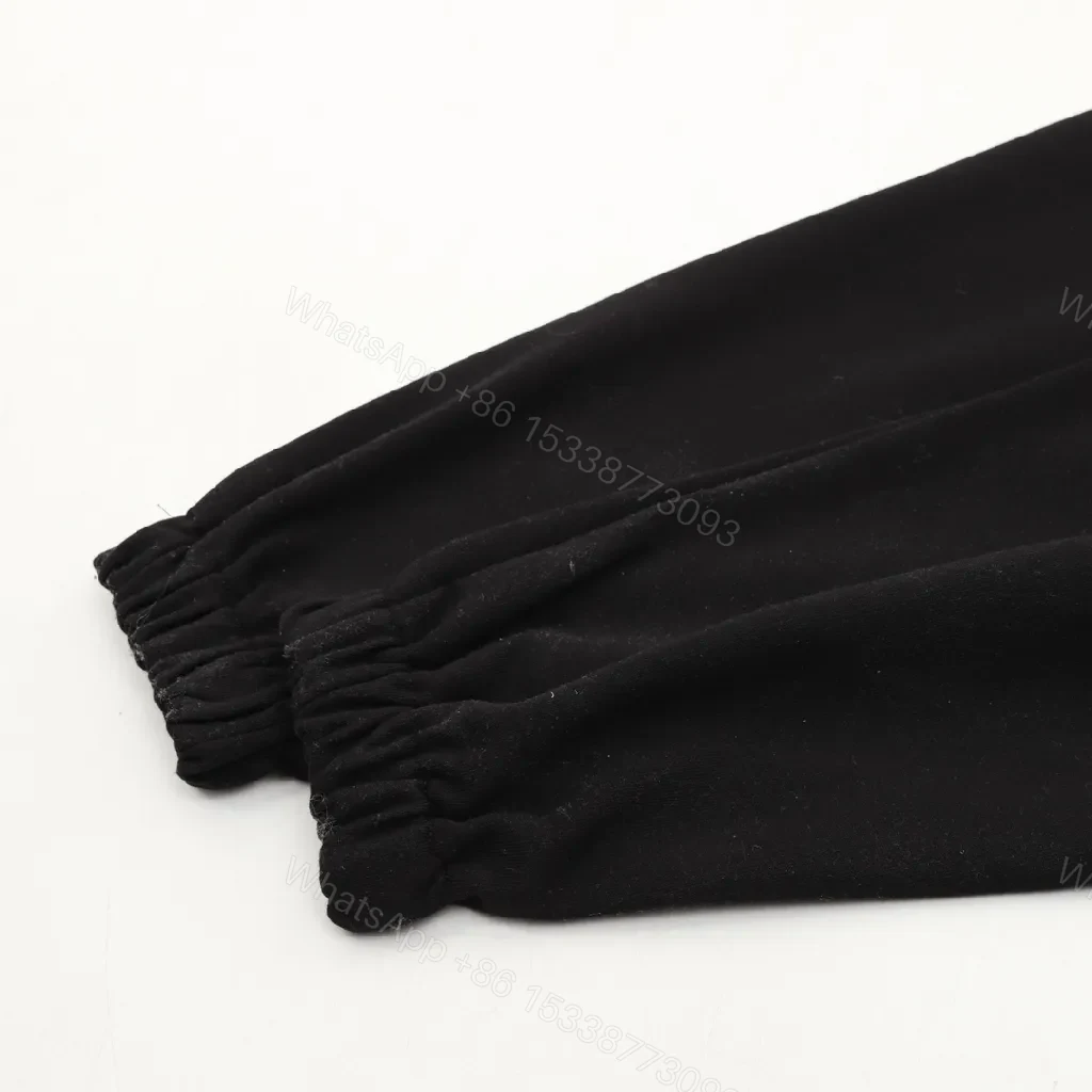View 7 of Minimalist Black Sweatpants – Premium Comfort, Signature Logo Joggers