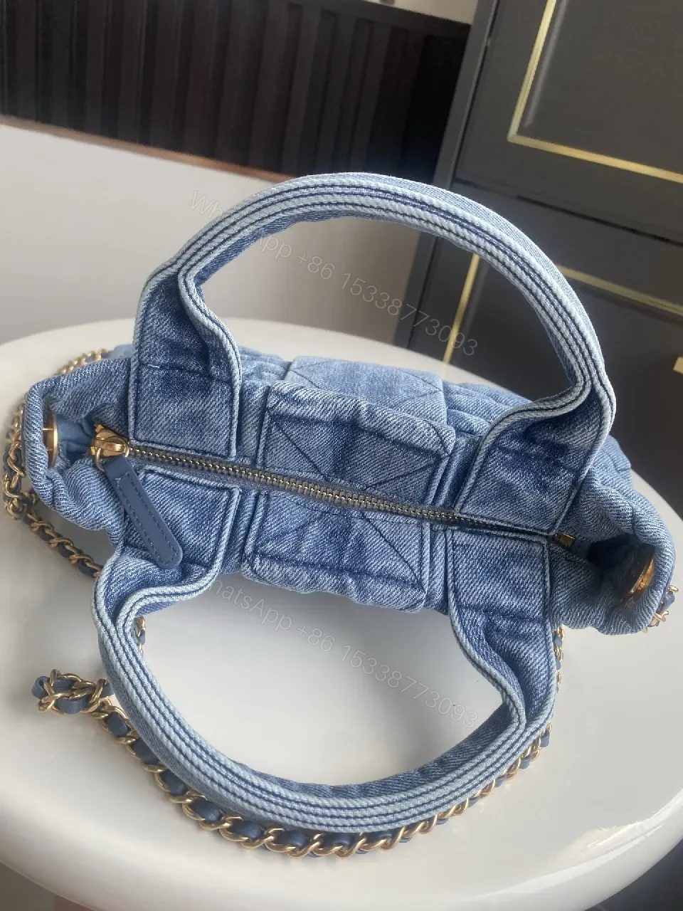 View 2 of Denim Quilted Mini Bag with Gold Hardware - Structured Chic