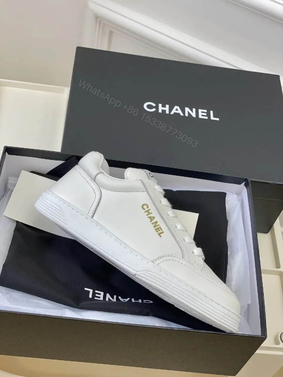 View 5 of White Leather Sneakers: Minimalist High-Tops with Gold Logo