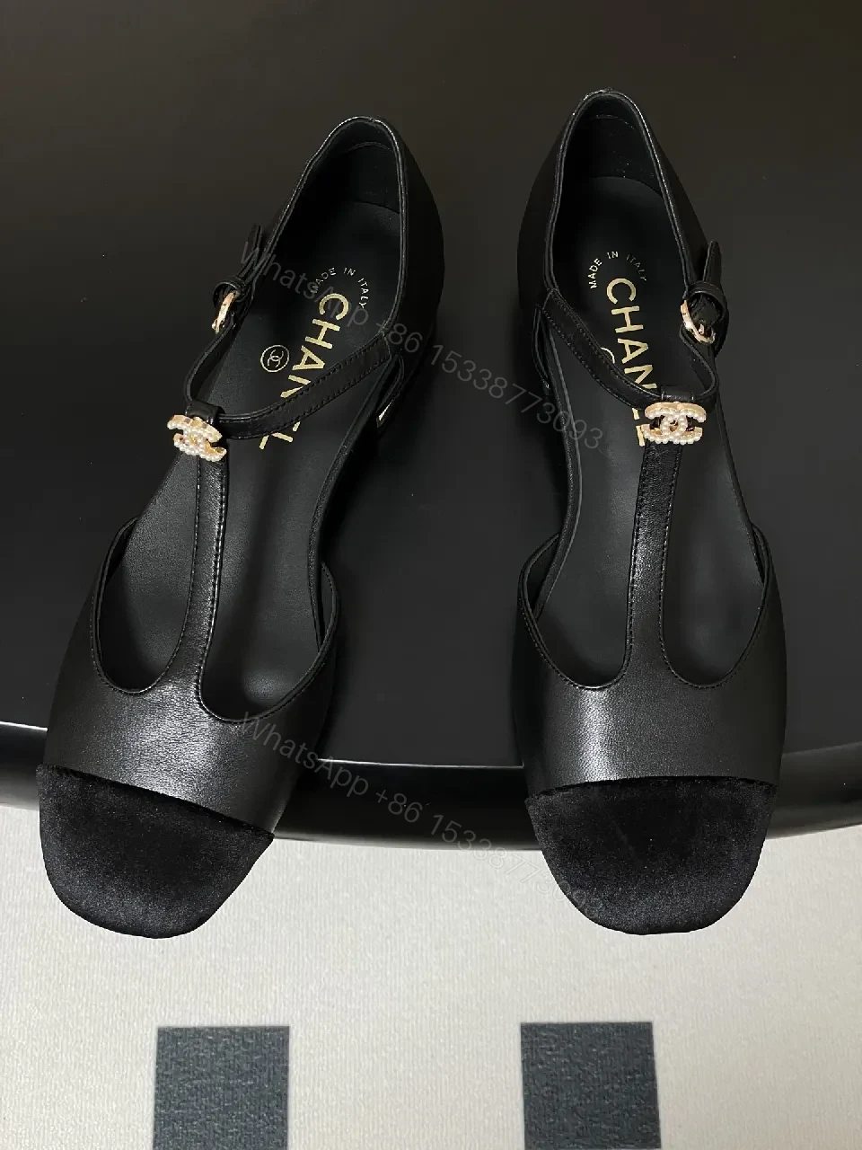 View 4 of Chic Black Suede T-Strap Pumps with Pearl Clasp