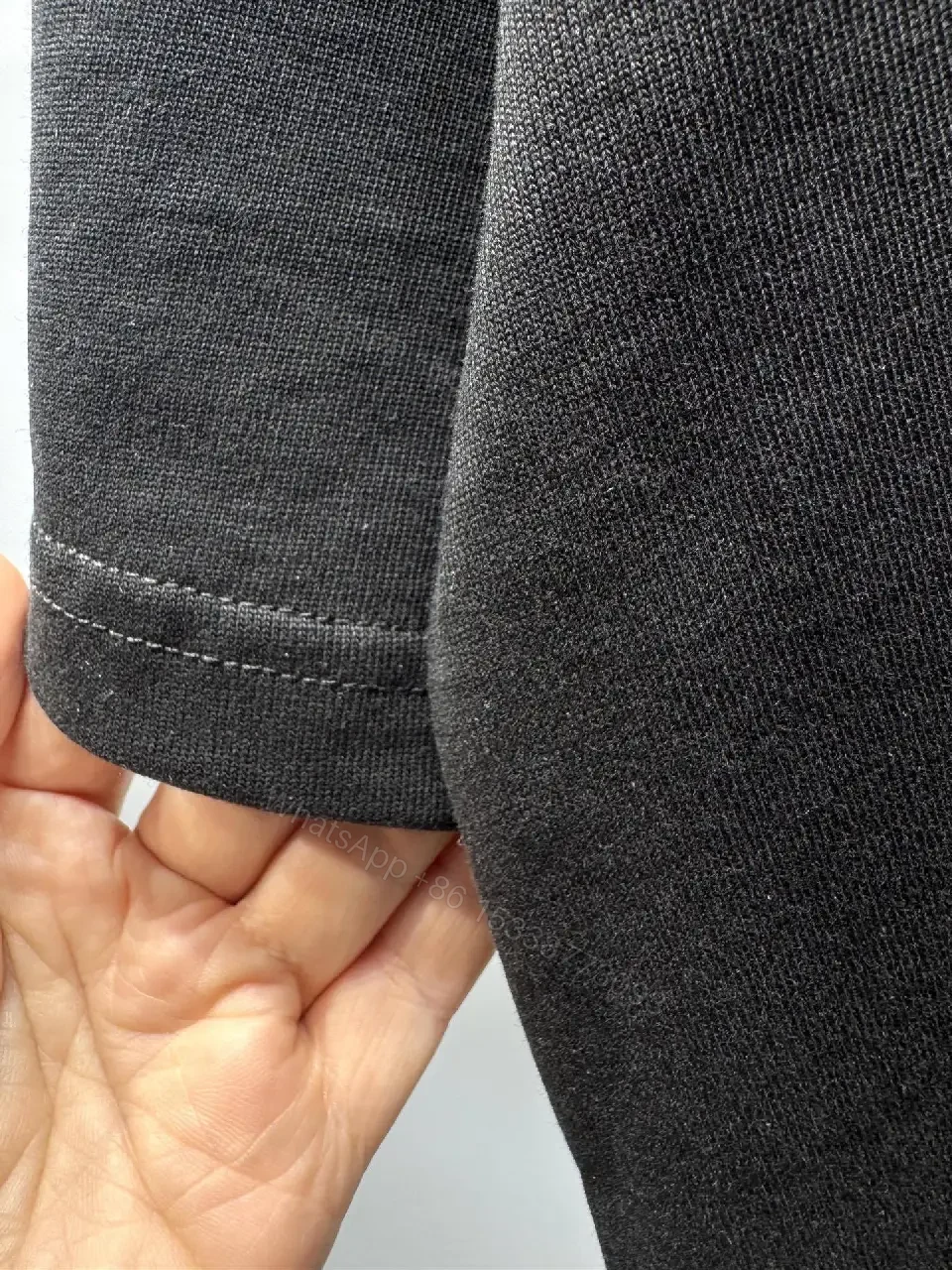 View 4 of Black Cotton Tee – Minimalist LV.M. Studio Detail, Unisex