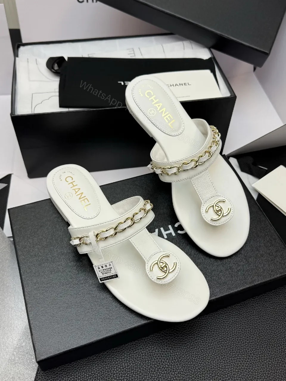 View 9 of Elegant White Leather Sandals with Gold Chain Accent