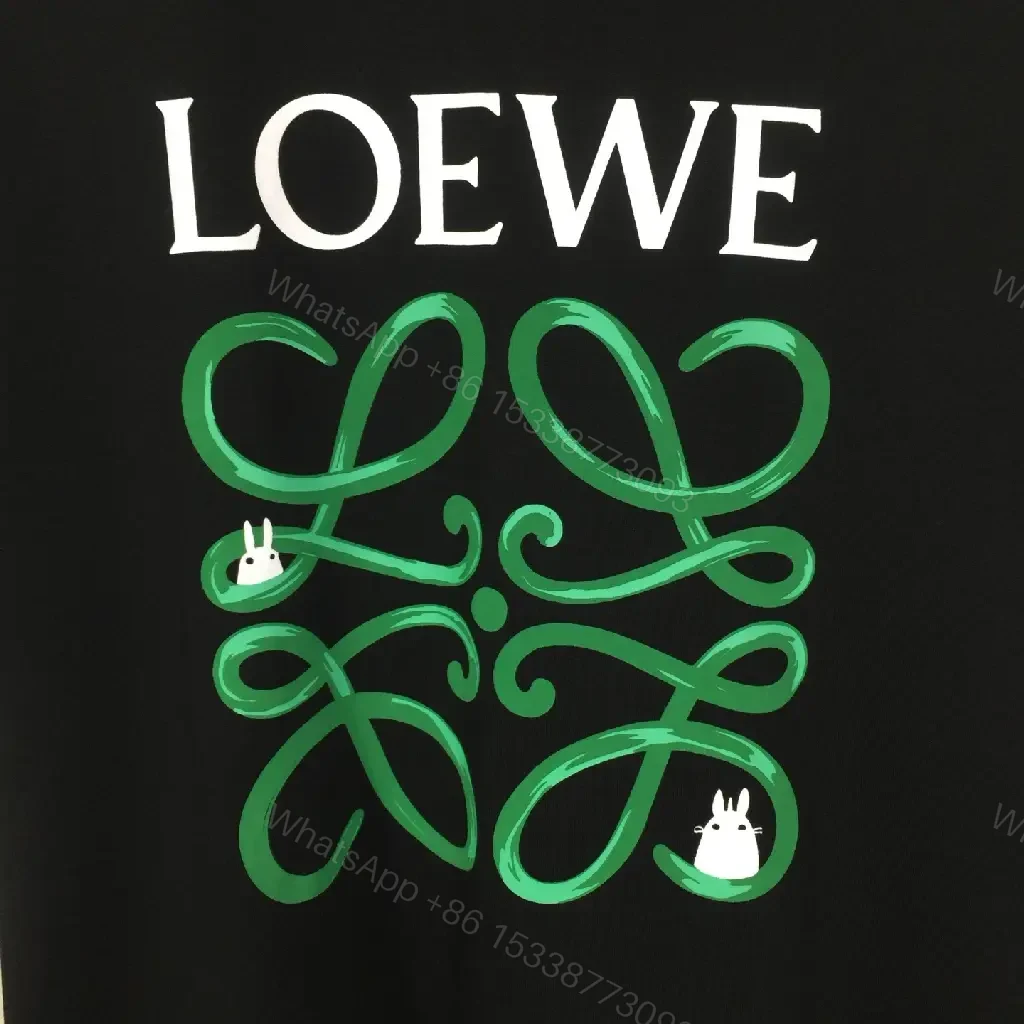 View 2 of Bold Graphic Tee with Luxe Charms + Monogram Logo Tee